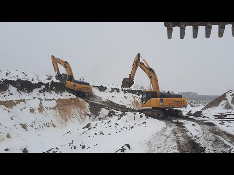 Видео: Последний снег, ковш совсем устал ! Погрузка самосвалов