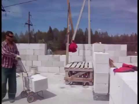 Видео: кран с захватом для блоков