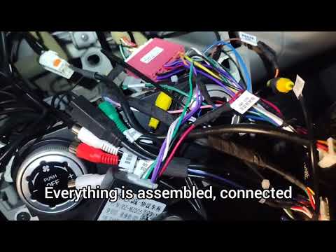 Видео: Установка андроид магнитолы Mazda CX 7.