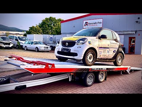 Видео: ЛУЧШИЙ легковой прицеп для перевозки автомобиля, СДЕЛАНО В ГЕРМАНИИ