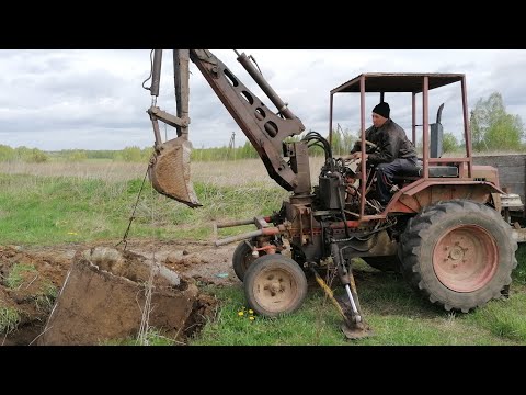Видео: обзор экскаваторной установки на трактор Т-16 (Т-16 экскаватор)