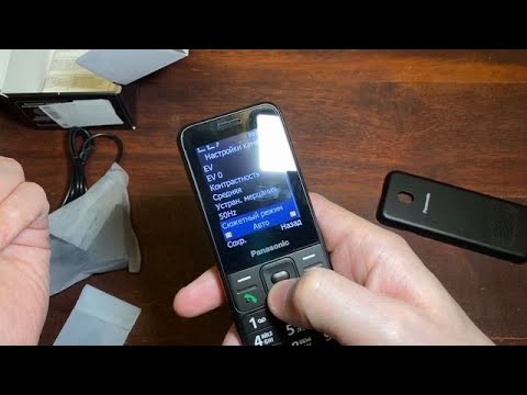 Видео: Распаковка и обзор на кнопочный телефон Panasonic KX TF200RU