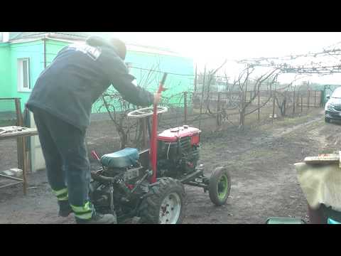 Видео: Механизм подъема навески мини трактора