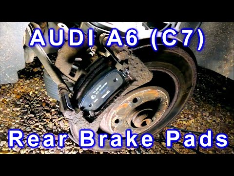 Видео: Замена задних тормозных колодок Audi a6 c7