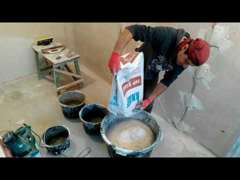 Видео: Штукатурка стен по маякам