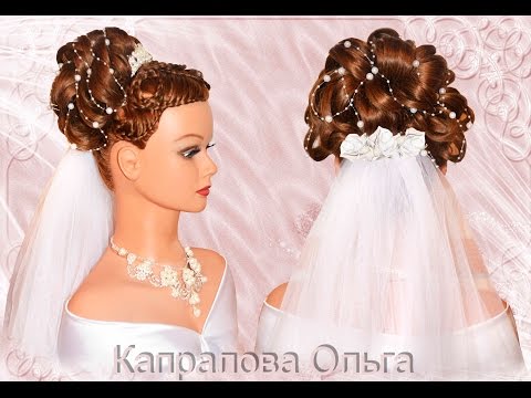 Видео: Вечерняя (свадебная) поднятая прическа с цветами. Капралова Ольга