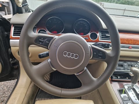 Видео: Ауди А8 Д3 - как снять и разобрать руль.