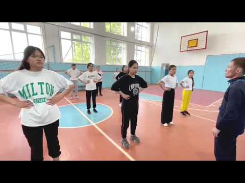 Видео: Жалпы дамыту жаттығулары. Бір орыннан ұзындыққа секіру. 7 класс