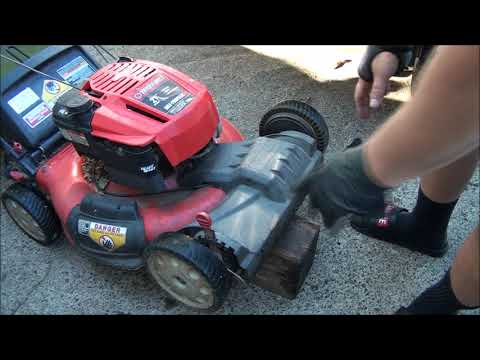 Видео: Газонокосилка Troy-Bilt с передним приводом. Оба колеса не вращаются. Проблемы с ремнем трансмисс...