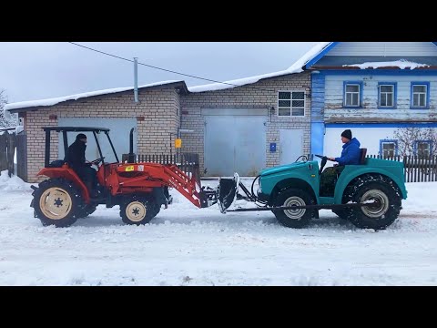 Видео: Минитрактор Kubota против самодельного Бархана