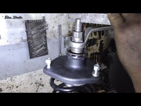 Видео: Замена передней стойки ВАЗ 1118 Калина
