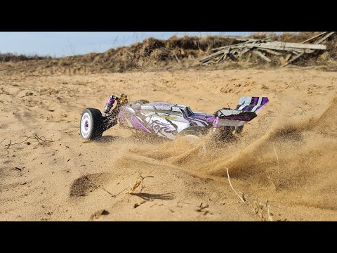 Видео: Быстрая багги для новичков, Wltoys 124019 ... 50+ км/ч