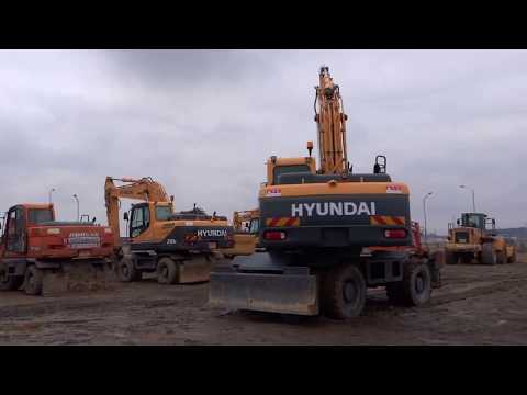 Видео: Экскаватор колесный hyundai r210w