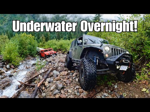 Видео: Может ли джип спасти Hummer (с прицепом) из разлившейся реки?
