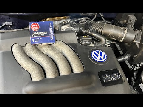 Видео: Замена свечей зажигания VW Jetta 2.0 2004 года | ПРОСТОЙ СПОСОБ!