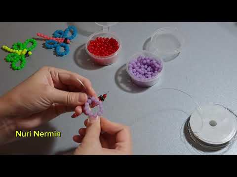 Видео: Стрекоза из бусин #стрекоза #бисер #плетениебисером #nurinermin #бусины #рек 
