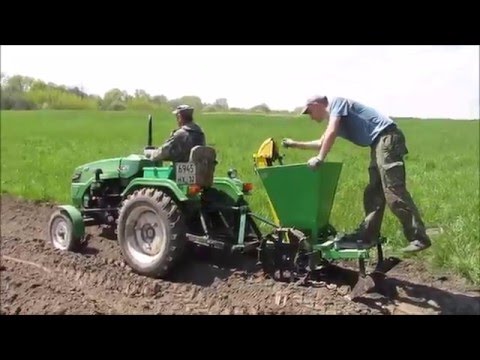 Видео: Синтай 220 + однорядная картофелесажалка ВОМЕТ