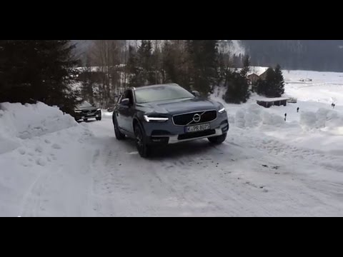 Видео: Тест-драйв Volvo V90 Cross Country 2017: ездим на автопилоте и проверяем полный привод