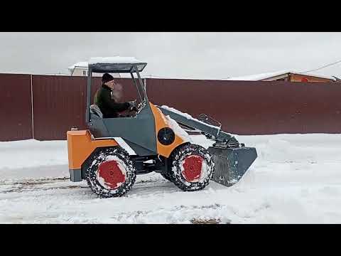 Видео: YTM мини погрузчик. Чистка дороги.