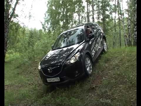 Видео: Тест-драйв Mazda CX-5.2013 про.Движение Мазда