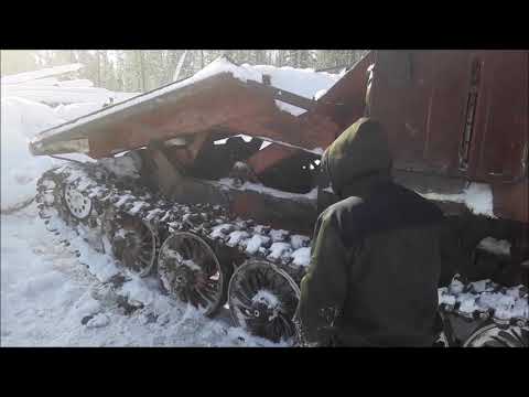 Видео: Трелевочник ТТ-4. Обуваемся после ремонта в лесосеке.