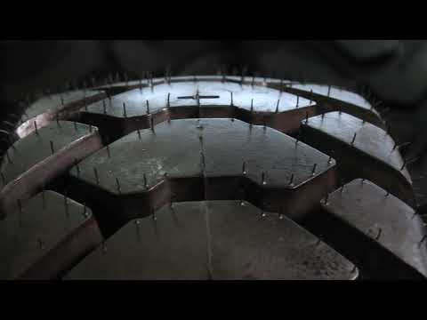 Видео: Сравнение шин для экскаваторов-погрузчиков с блочным протектором L5 Alliance и Ozka.