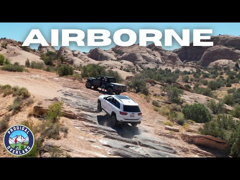 Видео: Jeep Grand Cherokee против Jeep Gladiator | Quadra-Drive II против Quadra-Trac II