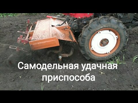 Видео: Фрезеровка междурядий  картофеля тяж.мотоблоком