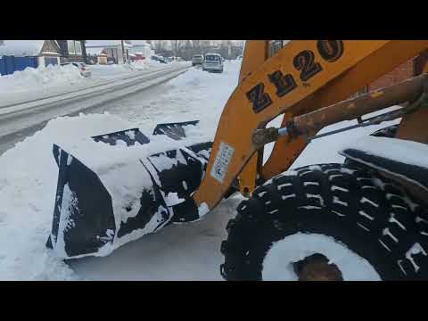 Видео: Фронтальный погрузчик zl 20