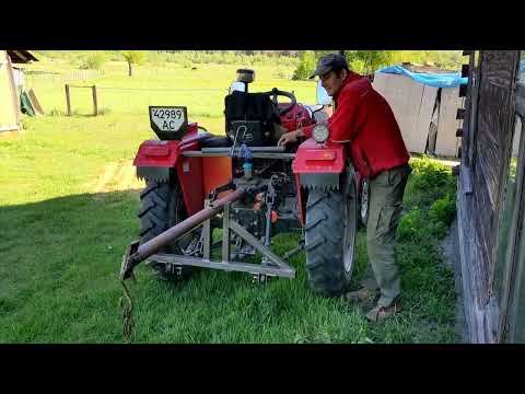 Видео: Кран для мінітрактора