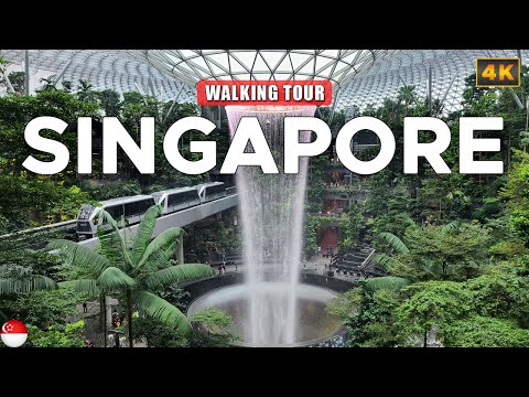 Видео: Пешеходная экскурсия по Сингапуру - Водопад в аэропорту Джуэл Чанги (Rain Vortex)