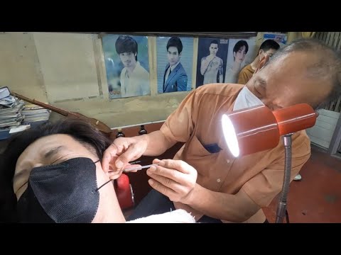 Видео: Специалист по чистке ушей в Таиланде