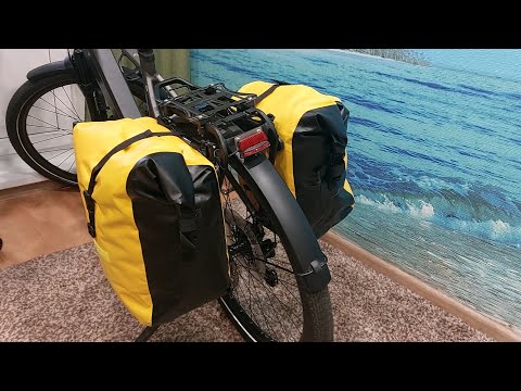 Видео: Обзор велосумки ЁJ "Памир" 27 литров + Тест на герметичность