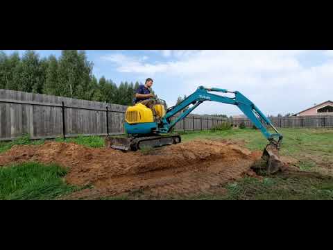 Видео: Планировка миниэкскаватором в Лунёво