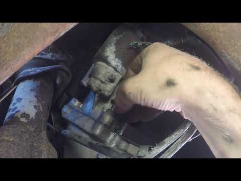 Видео: Замена стартера и соленоида Ford F150 2001 года