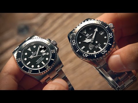 Видео: Rolex Submariner против Grand Seiko SBGA229 | Watchfinder & Co.