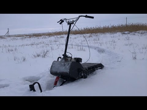 Видео: Этот Снегокат просто зверь тянет 2 человека по 100кг без усилий, 50 см снега для него не преграда