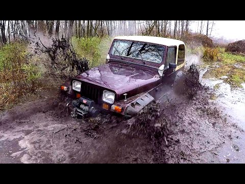 Видео: Американский Jeep Wrangler против двух советских Газ 69 на бездорожье.