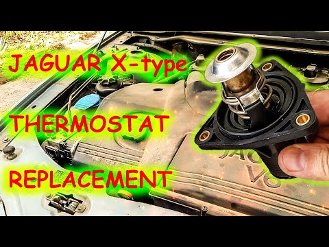 Видео: Замена термостата Jaguar X-type