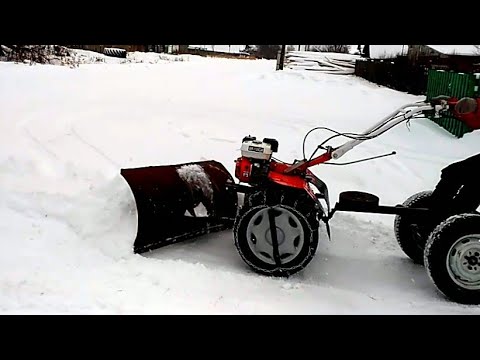 Видео: Чистка снега мотоблоком,