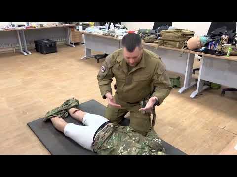 Видео: РУС- ОСМОТР РАНЕННОГО