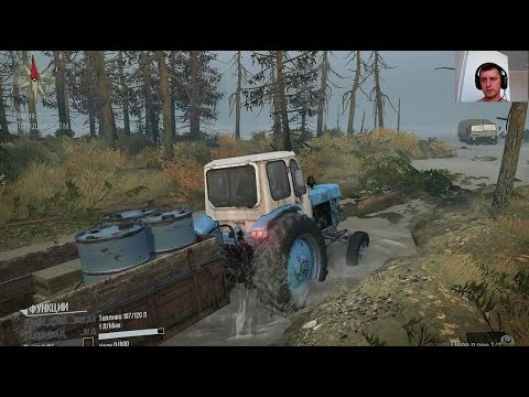 Видео: Сможет ли трактор выручить КАМАЗа заглохшего в лесу