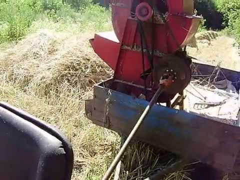 Видео: зерновая молотилка