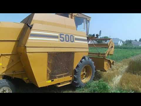 Видео: 115 САМПО 500 жнивує. Озимі ячмінь та пшениця. HARVEST SAMPO 500