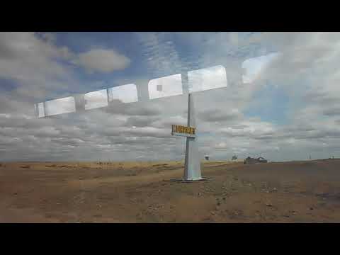 Видео: Заезд в Коунрад (Қонырат) мимо стелы с надписью и по улицам посёлка на автобусе № 4
