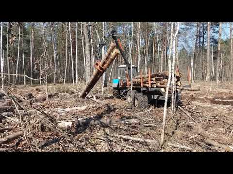 Видео: Лесной полуприцеп и манипулятор BMF в работе. Поставщик - ОДО "ДОРМАШЭКСПО"