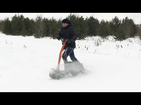 Видео: Мото-сноуборд, 8 л.с., вариатор TAV 2-40. Обзор и покатушки.