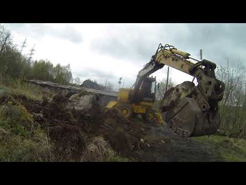 Видео: Экскаватор CASE в работе