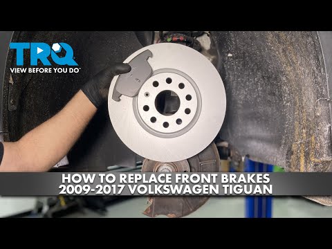Видео: Как заменить передние тормоза на Volkswagen Tiguan 2009-2017