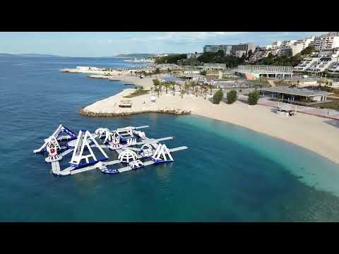 Видео: 4K Split Znjan City Beach. Жнян - самый протяженный и современный пляж Сплита.